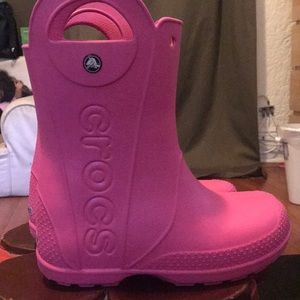 PInk Crocs rain boots